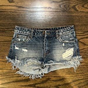 low rise ripped jean shorts